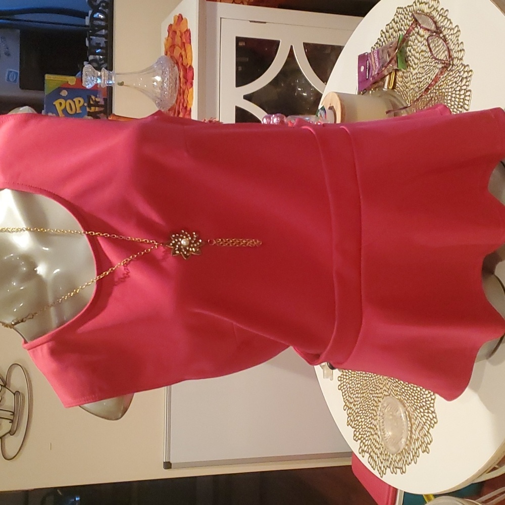Ashley Stewart cut out pendulum top